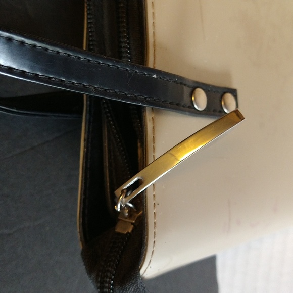 Beijo a pearlized gold color with black straps and trim. - Picture 6 of 14